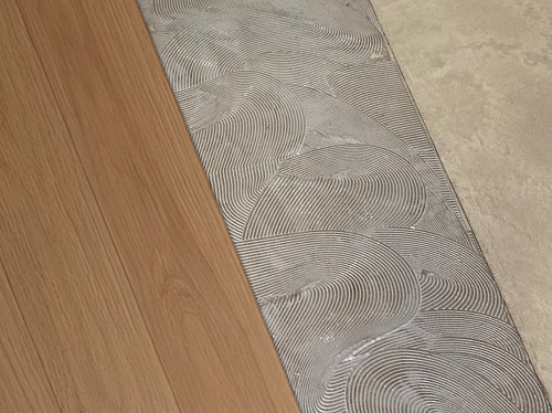 カッターで切断、接着剤施工